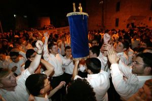 Encirclement, the Jewish ritual, Jews encircle the Torah scrolls while singing and dancing on the festival of Simchat Torah